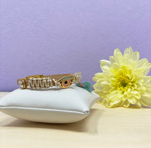 Load image into Gallery viewer, Iris evil eye leather bracelet on pillow