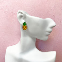 Load image into Gallery viewer, Pineapple wooden stud earrings on model
